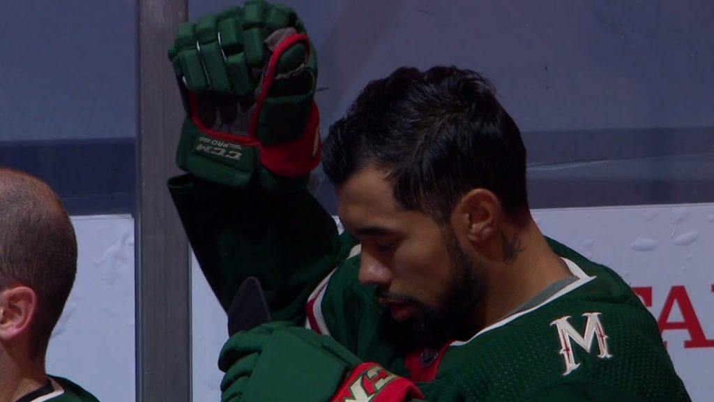 Dumba with fist raised for social justice, equality during O Canada